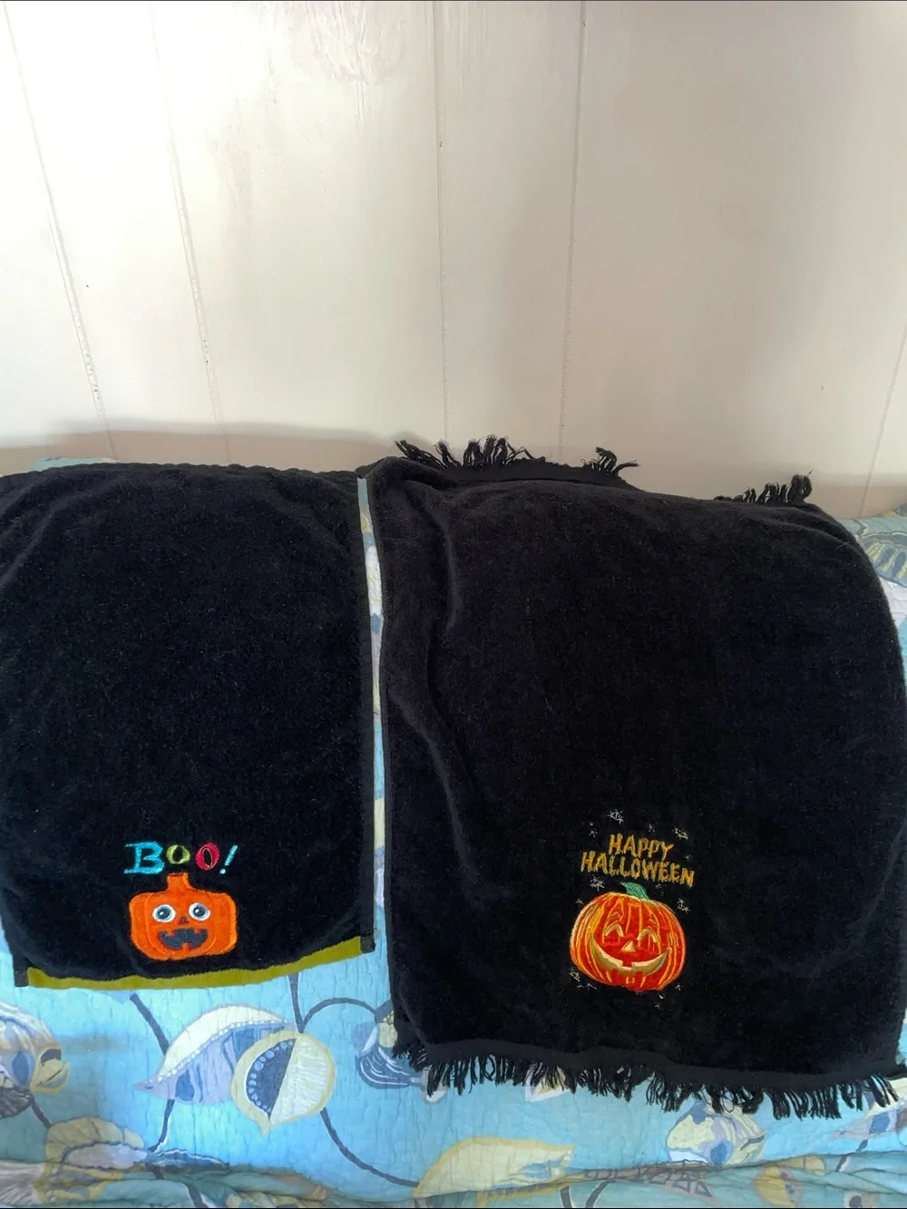 Two plush black Halloween towels - one hand towel & one fingertip